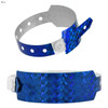A blue holographic wristband with a unique textured design and snap fastening. Features multiple holes for size adjustment.
