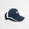 A navy blue cap with a white brim and an adjustable strap at the back, featuring a logo on the front.