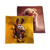 A set of two face washers featuring cartoon characters: one with a pink pig and the other with a smiling llama, in vibrant colours.