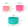 A collection of silicone boots for tumblers in pink, light pink, and turquoise, with size dimensions displayed.