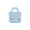 A light blue mini EVA bag charm with perforated design and two handles, featuring a logo.