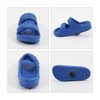 A blue clog shoe with an adjustable strap, featuring a textured sole and a logo on the side.