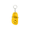 A yellow paw-shaped clog shoe keyring with a metal ring attachment. It features ventilation holes and a rounded toe.
