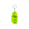 A bright yellow paw-shaped clog shoe keyring with a metal keychain attachment.