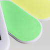 A foldable nail file block featuring green and yellow filing surfaces with a handle. It has a logo on the side.