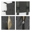 A grey tote bag featuring yoga mat straps, zip closure, and a snap button pocket. Includes adjustable straps and logo.