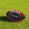A Mini Aussie Rules Ball in black with red accents, featuring white laces and a logo.