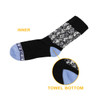 Patterned woven bamboo sock in black, white, and blue, featuring a towel bottom and a logo.