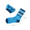 Crew woven work socks in shades of blue with a geometric pattern, one sock laid out and one rolled up beside it.