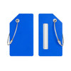 A blue soft silicone luggage tag with metal loops for attachment and a transparent window for information.