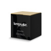 A black box featuring the Keepsake Collection logo, containing a mortar and pestle set. The design is sleek and modern.