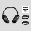 Black Skullcandy Hesh 360 headphones with a USB charging cable and audio cable, along with a user guide.