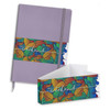 A purple notebook with a colourful leaf-patterned band and a matching pen gift set. The set includes a box.
