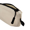 A small cream-coloured cosmetic bag with a black zipper and a zipper pull, featuring a sturdy design.