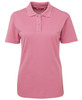 A pink polo shirt for women featuring a collar and buttoned placket, with a logo on the chest.