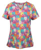 A printed scrub top featuring a vibrant pattern of colourful cats in shades of pink, purple, orange, and yellow.