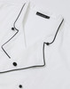 A white unisex executive chef jacket with black piping and buttons, featuring a branded label.