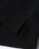 A close-up of the hem and cuff of a black unisex crew neck sweater, featuring a ribbed design and a small split detail.