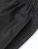 Lightweight nylon waterproof rain pants in black, featuring an elastic waistband and a smooth finish.