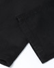 Black flexi chino pants with a smooth fabric texture, featuring a cuffed hem and subtle branding.