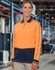 A long-sleeve polo in hi-vis orange and navy, featuring a logo, set in an industrial environment.