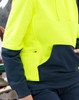 A bright yellow and navy blue two-tone water-resistant fleece hoodie with a front pocket and zipper detail.