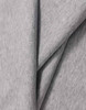 A grey cotton fabric with a soft, textured finish, draping smoothly in folds.