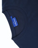A navy blue men's long sleeve cotton tee shirt featuring a round neckline and a tag inside the collar.