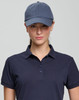 A navy cotton twill unstructured cap worn by a model, featuring a logo on the front.