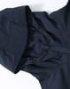 A unisex pro performance waterproof jacket in navy blue, featuring a hood and zip closure. It has a logo on the fabric.