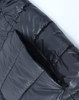 A black lightweight hooded puffer jacket featuring stitched details and an open zip pocket.