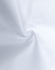 A close-up of white fabric showing a smooth cotton blend texture, highlighting its soft and comfortable quality.