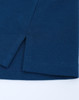 A navy blue men's polo featuring a pique texture and side vents at the hem. It has a logo.