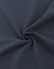 A close-up of dark navy fabric featuring a textured pique weave, highlighting its softness and quality.