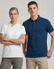 Men's ultrafine cotton pique polo in navy and women's in white, featuring a branding logo on the chest.