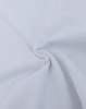 A close-up view of soft, ultrafine cotton pique fabric in white, showcasing its texture and weave.