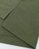 An olive green men's polo made from high-performance graphene fabric, featuring smooth seams and a modern design.