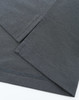 A high-performance grey polo with a smooth texture and a logo. Features short sleeves and fine stitching details.