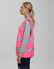A pink Hi Vis safety zip vest with reflective stripes and utility pockets, displayed on a model from the side.