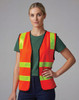 A hi-visibility safety vest in bright orange with reflective yellow stripes worn by a model.