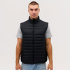 A black puffer vest with a high collar, featuring a quilted design, displayed on a model.