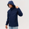 A navy utility jacket with a hood, featuring zippered pockets and a fitted design. It has a logo on the front.