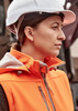 An orange women's softshell jacket with a zipper, worn by a woman in a white hard hat.