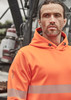 An orange unisex water-resistant hoodie with segmented tape, featuring a hood and a branded logo on the sleeve.