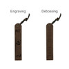 A vintage-style brown leather bookmark featuring engraving and debossing designs, with a decorative tie.