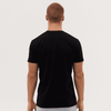 A black T-shirt designed for men, featuring a simple, classic cut with short sleeves.