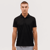 A black polo shirt worn by a model, featuring a classic collar and short sleeves, with a logo on the chest.