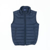 A navy blue youth puffer vest with a zip front and two side pockets, featuring a logo on the collar.