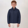 A navy puffer jacket with a zip closure and ribbed texture, designed for youth, worn by a model.