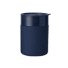 A ceramic coffee cup in navy blue with a matching lid. Features a smooth finish and has a logo.